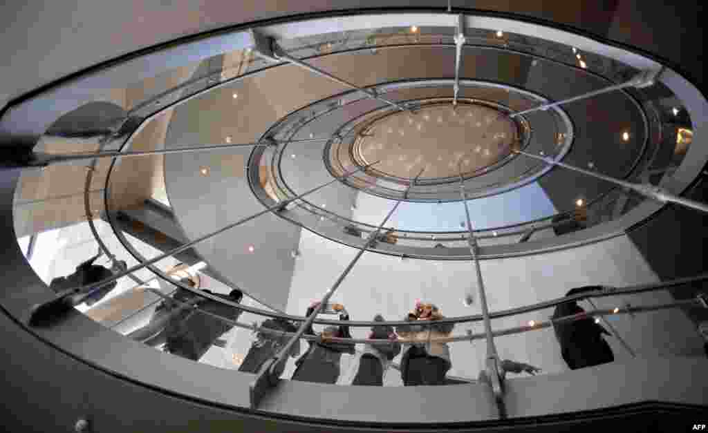 Journalists and other special guests toured the Mariinsky II, including its spiral staircase, one day ahead of the official opening.