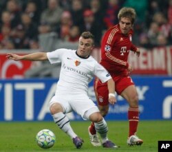 Xherdan Shaqiri gjatë një ndeshjeje për Baselin kundër Bayern Munich në Ligën e Kampionëve, në mars të vitit 2012.