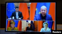 European Commission President Ursula von der Leyen, European Council President Charles Michel, German Chancellor Angela Merkel, French President Emmanuel Macron, and Chinese President Xi Jinping during a video conference in Brussels in December.