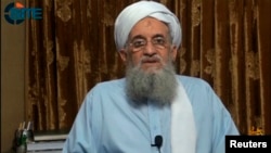 In the audio message, Al-Qaeda leader Ayman al-Zawahri vows that Al-Qaeda will help the Taliban in its struggle to establish a "caliphate." (file photo)