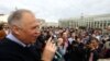 Belarusian opposition leader Mikalay Statkevich delivers a speech during a protest rally on Belarusian Independence Day in Minsk on July 3. 