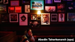 An Iranian young woman sits in the Rock Cafe in Tehran, Iran, 11 July 2017