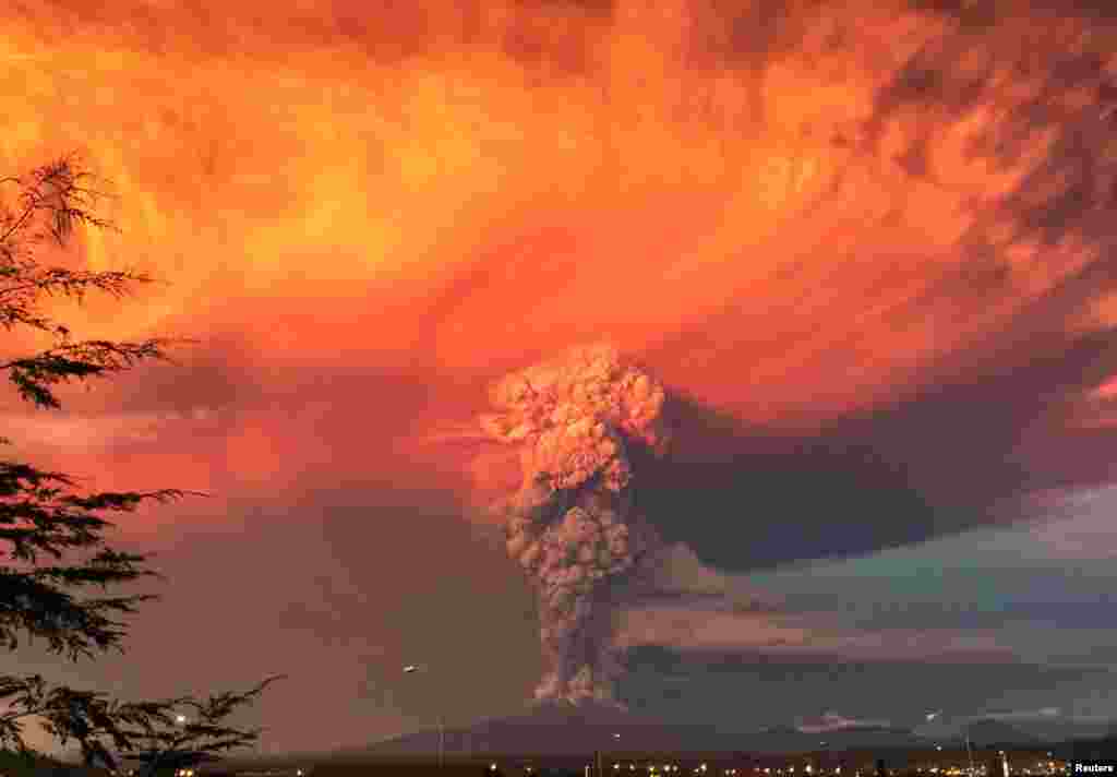 Smoke and ash rise from the Calbuco volcano as seen from the city of Puerto Montt in southern Chile. The Calbuco volcano erupted for the first time in more than five decades this week, sending a plume of ash more than 10 kilometers in the air. (Reuters/Rafael Arenas)