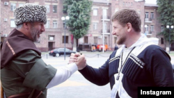 Chechen leader Ramzan Kadyrov (right) and Vakhit Uzmayev, the republic's new presidential and government administration chief and one of Kadyrov's most efficient, ruthless, and feared henchmen. 