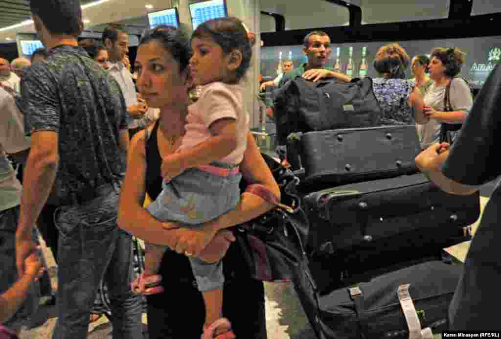 Armenia -- Syrian Armenians arrive in Yerevan, 17Aug2012