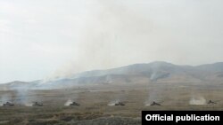 Nagorno-Karabakh - A column of Karabakh Armenian tanks on the move during a military exercise, 23Oct2012.