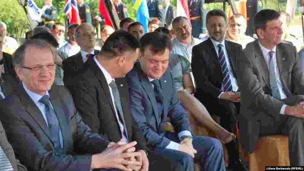 Minister of the Interior Dorin Recean (right) attends the ceremony.