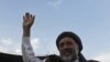 The campaign has attracted a much larger field of candidates than the 2005 parliamentary polls. Haji Mohammad Mohaqiq, an ethnic Hazara member of parliament, waves to supporters as he leaves a campaign rally in Jabar Khan, west of Kabul.