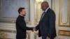 Ukrainian President Volodymyr Zelenskiy (left) welcomes U.S. Defense Secretary Lloyd Austin before their meeting in Kyiv on October 21.