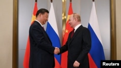 Kazakhstan - Russian President Vladimir Putin and Chinese President Xi Jinping attend a meeting on the sidelines of the Shanghai Cooperation Organization summit in Astana, July 3, 2024. 