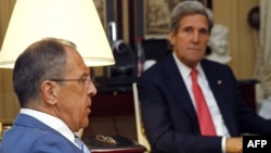 Russian Foreign Minister Sergei Lavrov (left) with U.S. Secretary of State John Kerry in Paris on May 27