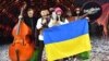 Український гурт Kalush Orchestra після перемоги з піснею Stefania на «Євробаченні-2022». Турин, Італія, 15 травня 2022 року