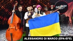 Kalush Orchestra from Ukraine poses after winning the 2022 Eurovision Song Contest in Turin early on May 15.