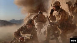 FILE: A NATO military operation to clear compounds used by the Taliban in the area of Barikjo in Kajaki.