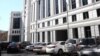 Armenia - Cars parked outside a new government building in Yerevan, 17May2016.