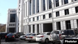 Armenia - Cars parked outside a new government building in Yerevan, 17May2016.