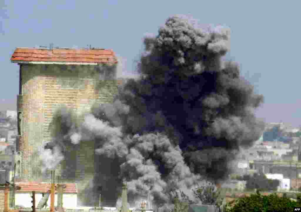 Suriyanın Homs şəhərində hakimiyyət nümayəndələriylə müxalif qüvvələr arasında qarşıdurma davam edir