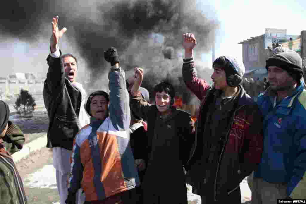 Protesters outside Bagram air base, one of the international forces' main Afghan facilities, on February 22.