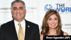 Reza (left) and Yasmine Pahlavi attend an awards gala in New York in May 2016.