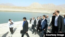 Esagh Jahangiri, vice president of Iran visits a dam near Tehran, Sep20, 2014