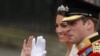 U.K. -- Prince William and his wife Catherine, Duchess of Cambridge, wave as they travel to Buckingham Palace in the 1902 State Landau, along the Procession Route, London, 29Apr2011