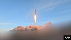 Video grab released by Iran's Revolutionary Guard Corps (IRGC) on March 12 shows launch of Iranian missiles.