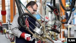 Worker of SAIPA, Iranian car (auto) manufacture works at a production line. File photo