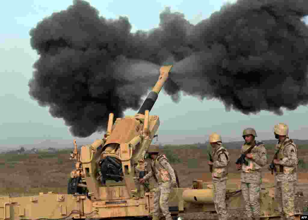 The Saudi Army fires artillery shells toward Yemen from a post close to the Saudi-Yemeni border in southwestern Saudi Arabia. Saudi Arabia is leading a coalition of several Arab countries that since March 26 has carried out air strikes against Shi'ite Huthi rebels who overran the capital, Sanaa, in September and have expanded to other parts of Yemen. (AFP/Fayez Nureldine)