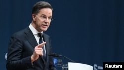 NATO Secretary General Mark Rutte speaks in Berlin on December 11.
