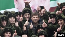 Is the Kremlin no longer ready to look the other way on transgressions by Chechen leader Ramzan Kadyrov's (center) entourage in Moscow?