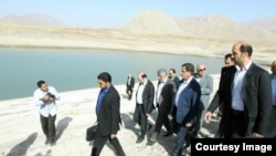 Esagh Jahangiri, vice president of Iran visits a dam near Tehran, Sep20, 2014