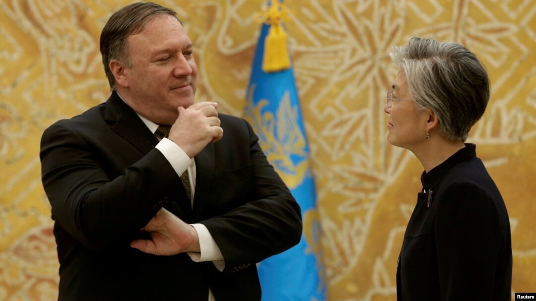 Mike Pompeo i Kan Kjung Hva