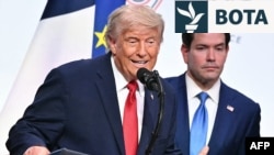 Presidenti i SHBA-së, Donald Trump,  së bashku me sekretarin e Shtetit, Marco Rubio, gjatë një konference për shtyp në mbyllje të samitit të G7 në Francë, më 17 qershor.