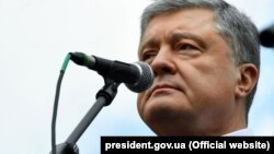 UKRAINE – Ukrainian President and presidential candidate Petro Poroshenko addresses his supporters during a rally in Kyiv on April 19, 2019