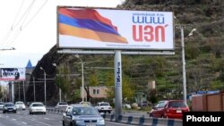 A billboard in Yerevan urges Armenians to vote for controversial constitutional amendments.