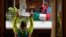 ITALY --Personal trainer Antonietta Orsini carries out an exercise class for her neighbours from her balcony while Italians cannot leave their homes due to the coronavirus disease (COVID-19) outbreak, in Rome, Italy, March 18, 2020. 