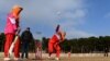 Afghan women play cricket at the grounds of the stadium in the western city of Herat in 2015.