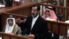 Saddam Hussein in court last month