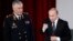 Președintele rus President Vladimir Putin (dreapta) și ministrul de interne Vladimir Kolokolțev, martie 2016