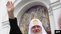 Patriarch of Moscow and All Russia Kirill waves during his visit to Odesa on July 20.