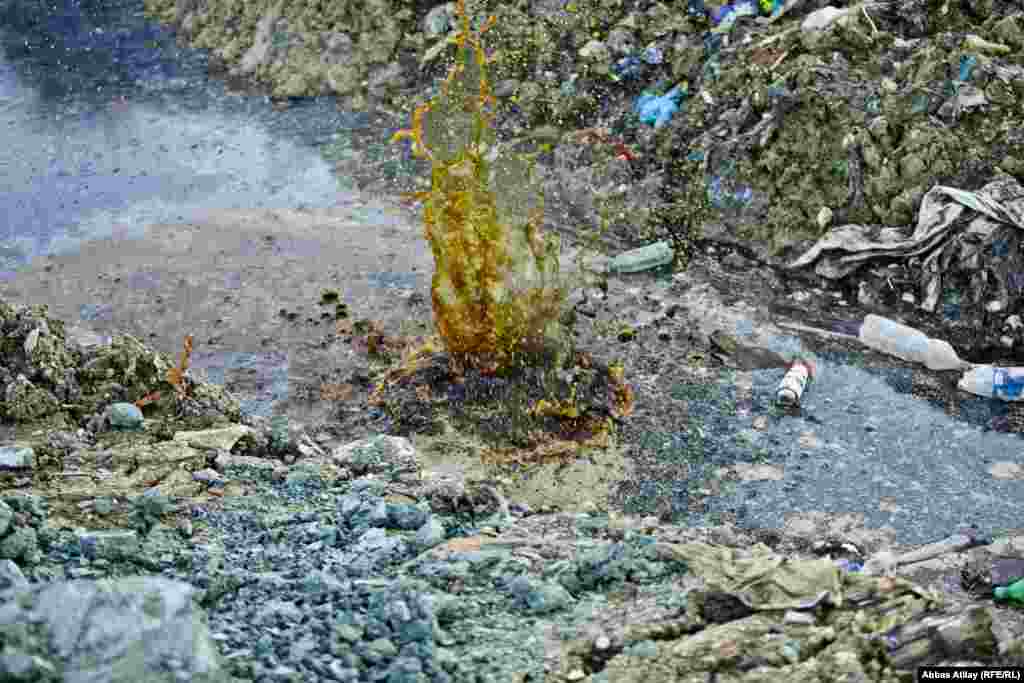 Pools of stagnant water collect on the dump.