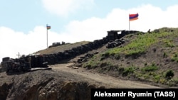 ARMENIA -- Azerbaijani (L) and Armenian checkpoints at the Sotk gold mine on the Armenian-Azerbaijani border, Gegharkunik province, June 18, 2021