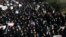 Iran -- Iranian protesters chant slogans at a rally in Tehran, Iran, Saturday, Dec. 30, 2017