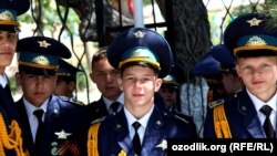Uzbekistan - students of military school taking part in victory parade at mass graves in the Volgograd street of Tashkent city, 09May2012