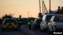 Кипрдеги Британ авиабазасынын кире бериши. Иллюстрациялык сүрөт.