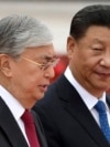 Qasym-Zhomart Toqaev (left) and Xi Jinping meet in Beijing in 2019.