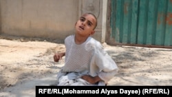 Ten-year-old Qudratullah cannot walk, run, or talk because he is a victim of polio virus.