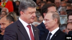 Ukrayna prezidenti Petro Poroshenko və Rusiya prezidenti Vladimir Putin