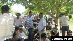 Kazakh oil workers picket the Manghystau regional administration office in Aqtau on June 2.