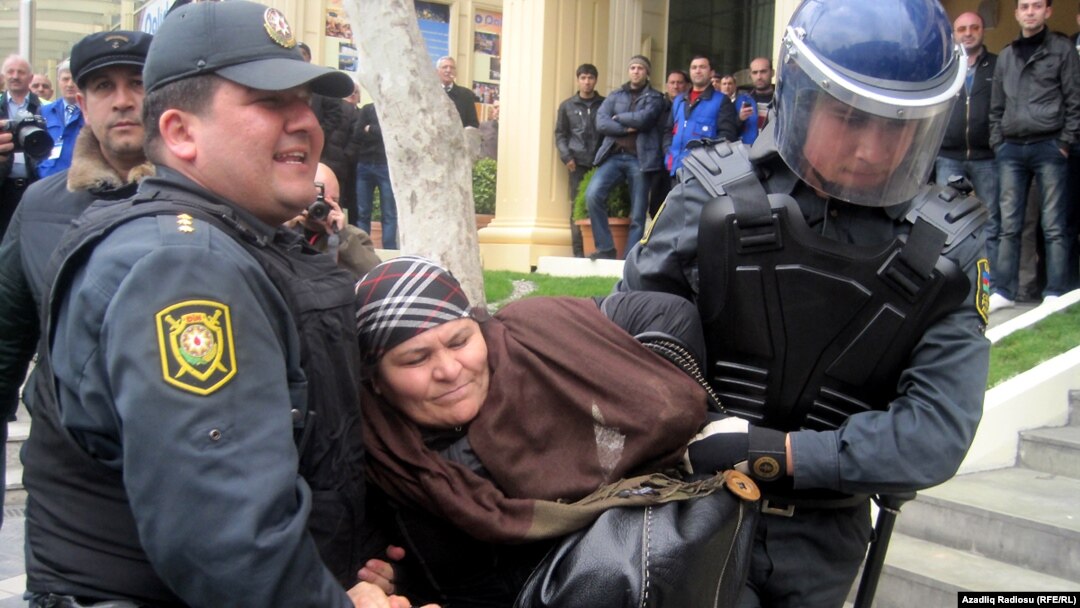 Riot police break up the protest in Baku on April 2. (file photo)